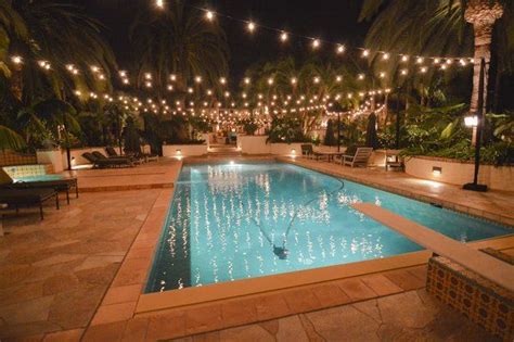 https://mikethepoolman.com/wp-content/uploads/2017/06/Lights-Over-Swimming-Pool-1.jpg