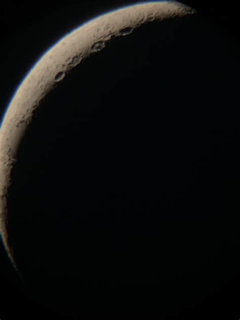 What’s the small blue ring around the moon? Is that the moons faint ...