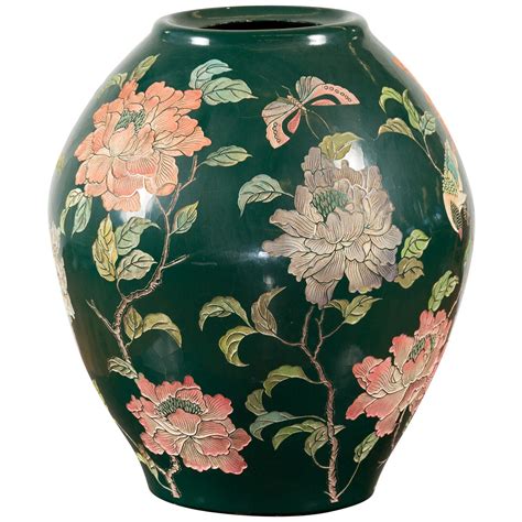 Vintage Chinese Handcrafted Green Vase with Incised Floral and Butterfly Decor For Sale at 1stDibs