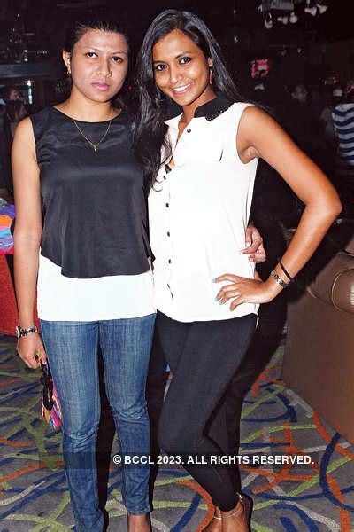 Kristina and Ratha pose during the New Year's Eve party, held in Kochi