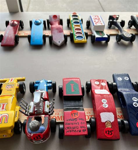 Adult Corporate Pinewood Derby supports Boy Scouts