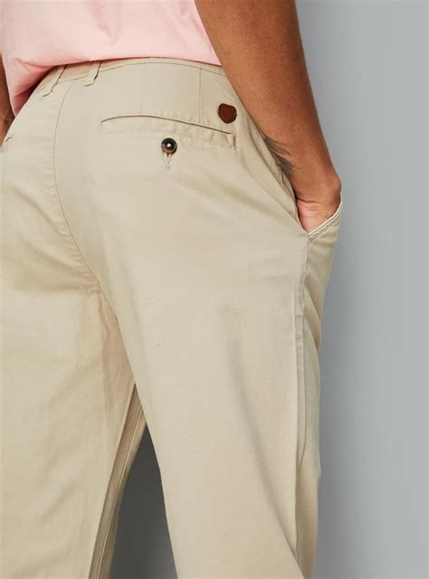 Buy Men Solid Stretchable Slim Fit Chinos Online at just Rs. 1399.0 ...
