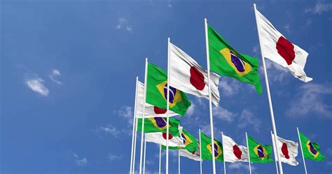 Brazil and Japan Flags Waving Together in the Sky, Seamless Loop in Wind, Space on Left Side for ...