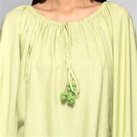 Green Pom Pom Poncho – Resort Wear – First Resort by Ramola Bachchan