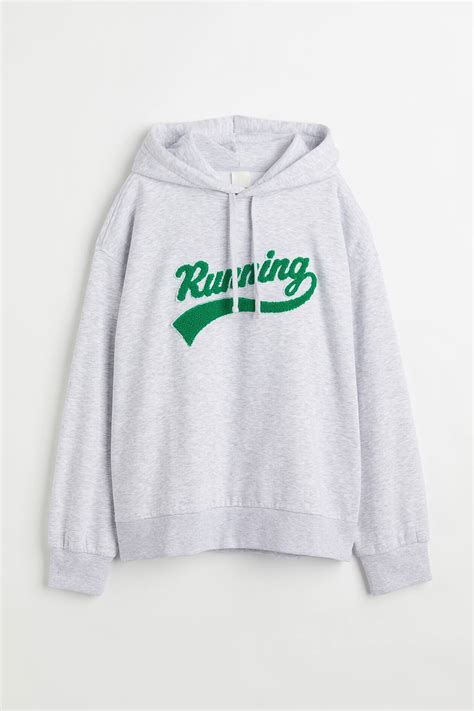 Motif-detail hoodie - Light grey marl/Running - Ladies | H&M IN
