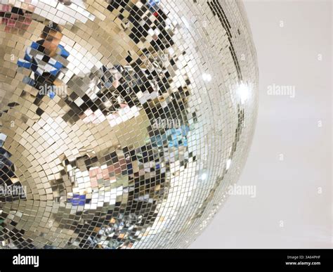 Mirror glass ball. Yellow and golg colors Stock Photo - Alamy