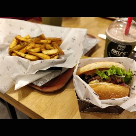 Move Beyond Burger King & Try Sumptuous Burgers & Fries At AKU's | LBB