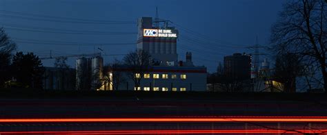 Giant logo on façade of MC powder tower - MC-Bauchemie