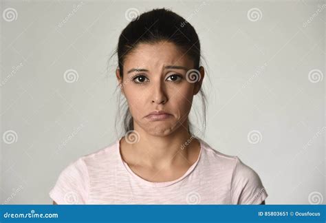 Young Beautiful Hispanic Sad Woman Serious and Concerned in Worried ...