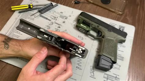 Image result for Glock Slide Lock Spring Install