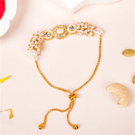 Stone And Pearl White Kundan Rakhi Set For Couple Online - Premium Gift ...