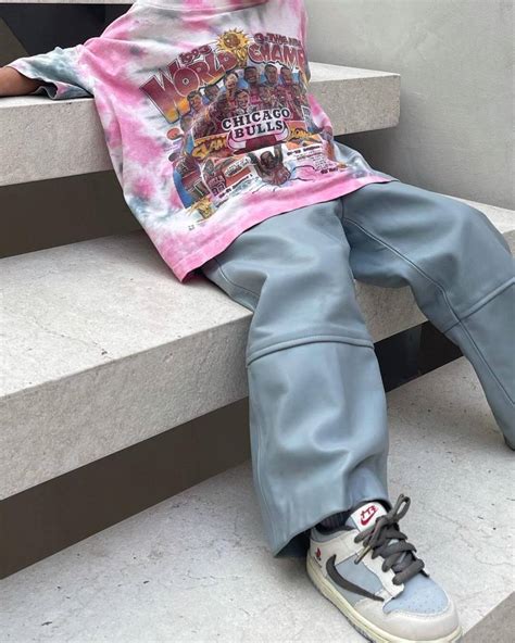 Stormi Wears the Travis Scott x PlayStation Dunk Lows – aGOODoutfit