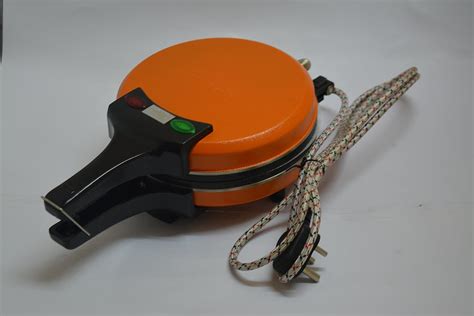 Buy Sanghvi Roti Roaster (Orange) Online at Low Prices in India - Amazon.in