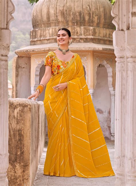 Laxmipati Leheriya Printed Chiffon Saree in Mustard Color with Unstitc