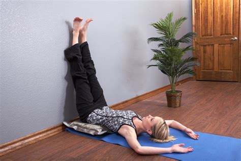 Legs Up The Wall Pose: How to Do It and the Benefits | The Output by Peloton