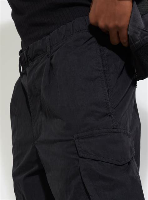 Buy URB_N Men Carrot Fit Parachute Cargo Pants Online at just Rs. 1699. ...