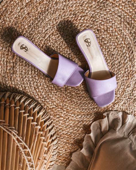 Asymetrical White mid block heels