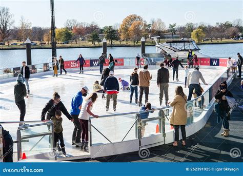 Winter Skating Rink in the Potomac River in Washington. Citizens with Children Go Ice Skating ...