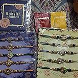 Dreamica Set of 10 Rakhi with Greeting Card and Tilak Set Combo | Best ...