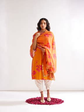 Gulmohar back tie-up kurta Paired with side pleated dhoti- Spicy Orang