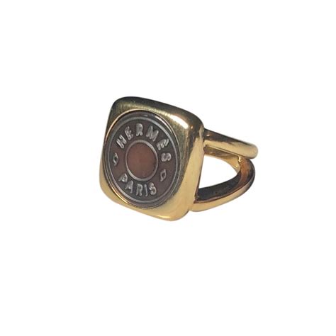 HERMÈS gold color metal shell ring “sellier” | NOIR ONLINE