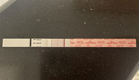 Okay! Freaking out but this looks like a positive?? Dpo 13 easy@home ...