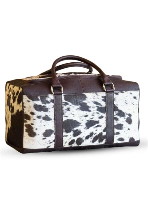 https://www.thewesternoutfitters.com/wp-content/uploads/2023/03/Tri-Color-Cowhide-Leather-Duffel-Bag-Western-outfitters-001.webp