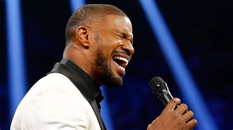 Download American Singer Jamie Foxx Singing National Anthem Wallpaper | Wallpapers.com