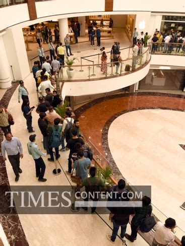 Apple store Business Photo Customers check out the newl...