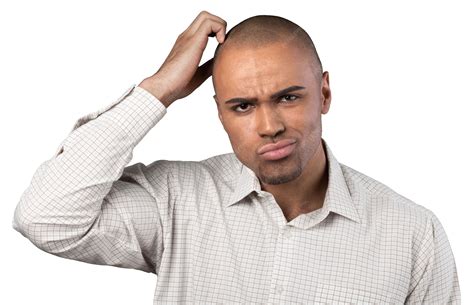 Premium Photo | Confused young man scratching his head