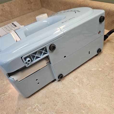 Image result for How to Thread a Kenmore Mini Ultra Sewing Machine