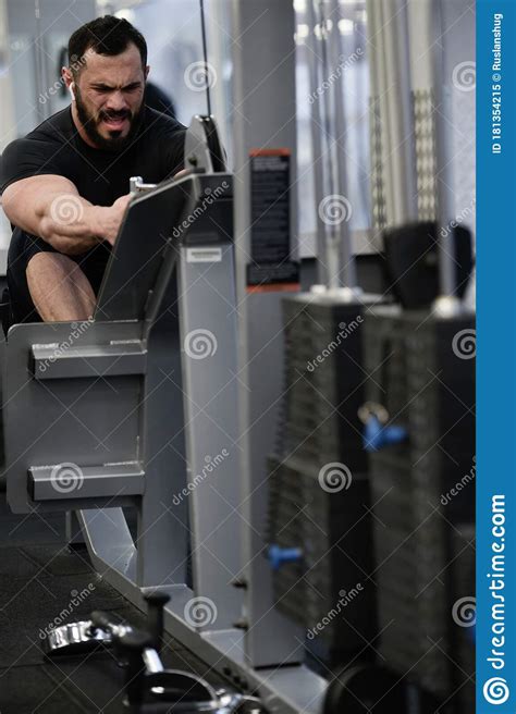 Strong Young Athlete Male With Beard Training On Fitness Exercise ...