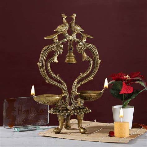 Buy Ethnic Carved Peacock Over Brass Twin Diya Brass Showpiece Online ...