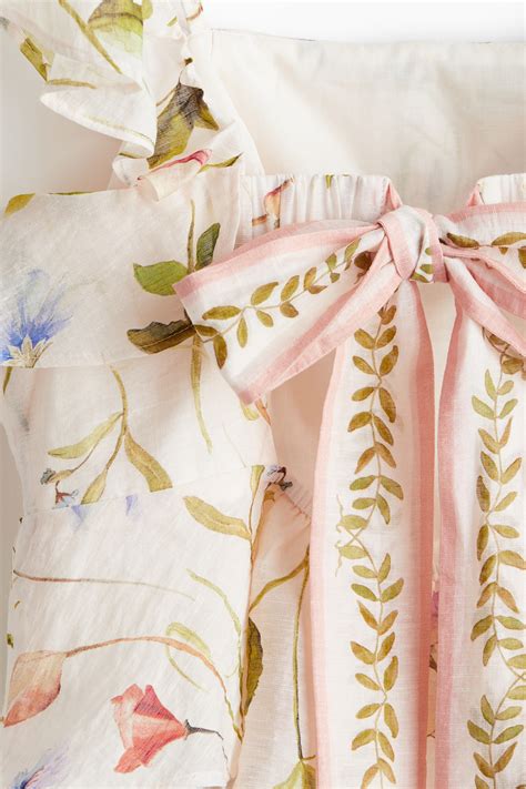 Peplum top - Cream/Floral - Ladies | H&M IN