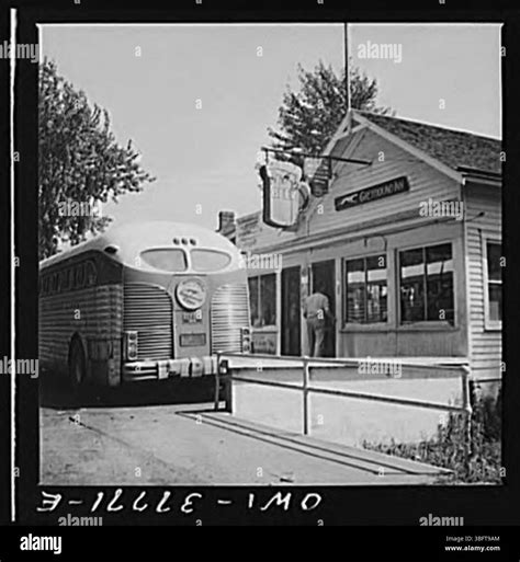 This image shows a Greyhound bus parked at a rest area in Indiana ...