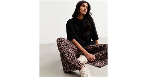 Brown Textured Animal Print Wide Leg Trousers | New Look