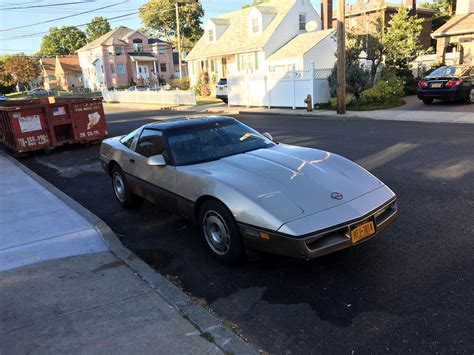 My very BROWN, regular 87 corvette that I owned for about 2 months. It had 17,800 miles on it ...
