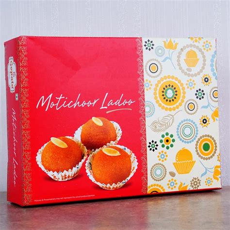 Send Round Stone Rakhi And Motichoor Laddoo Online