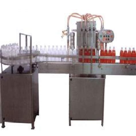 Automatic Liquid Filling Machine Manufacturers In Surat - Navbharati ...