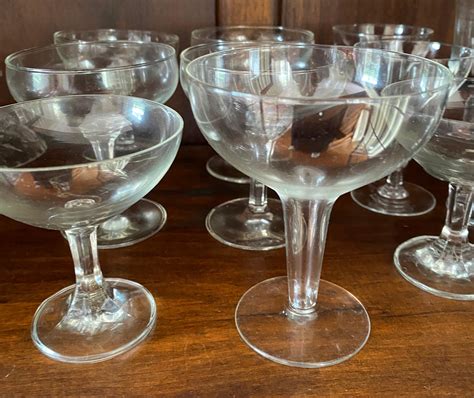 Lot - A Collection of Champagne Coupes & Glasses