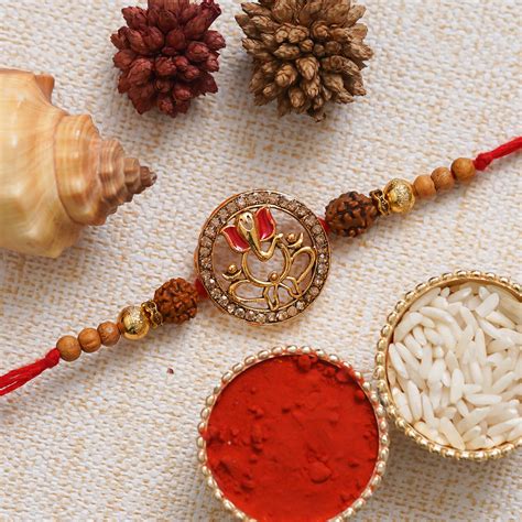 eCraftIndia Lord Ganesha with Rudraksha Religious Designer Rakhi with