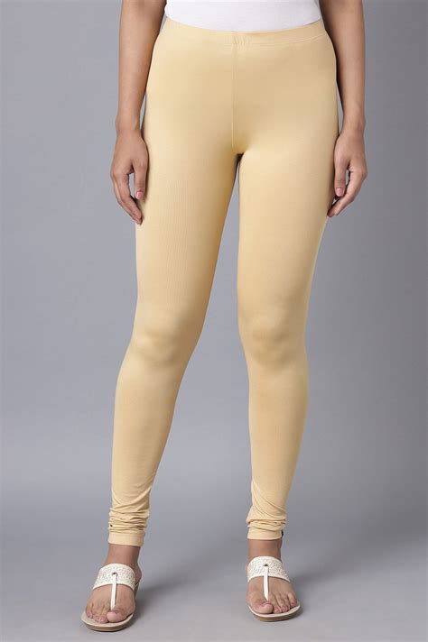 Buy Gold Skin Fit Churidar Online for Elleven