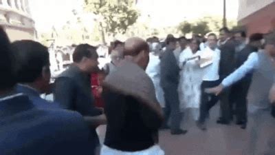 Watch: Rahul Gandhi hands Tiranga to Rajnath Singh during Congress ...