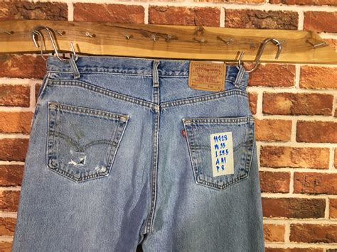 รหัส11728 Levi's505(หมึกเเดง) Made in Canada เลขกระดุม217 วัดจริง เอว33 ...