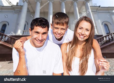 Happy Family Sunning On Beach On Stock Photo 1621989160 | Shutterstock