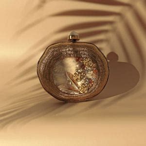 The Tan Clan–Designer Clutches,Potlis&Luxe Handbags for Every Occasion