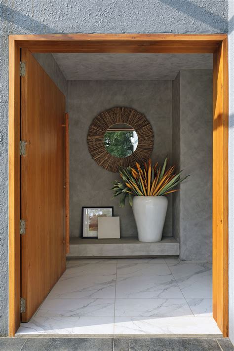 Vadodara: Rustic finishes and a grey palette claim ownership in this ...