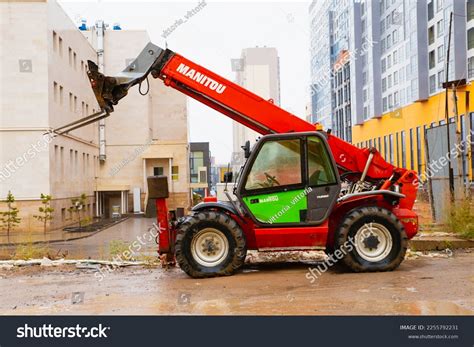 Image result for Manitou Cabless Telehandler Loader