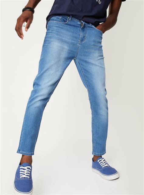 Buy Men Carrot Fit Washed Jeans Online at just Rs. 699.0 ...