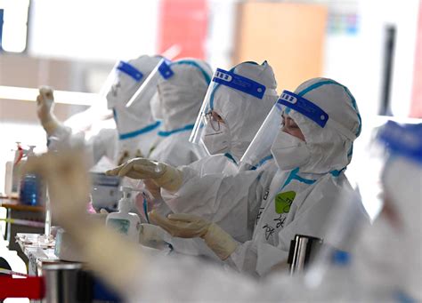 郑州开展第四轮全员核酸检测_图片新闻_中国政府网